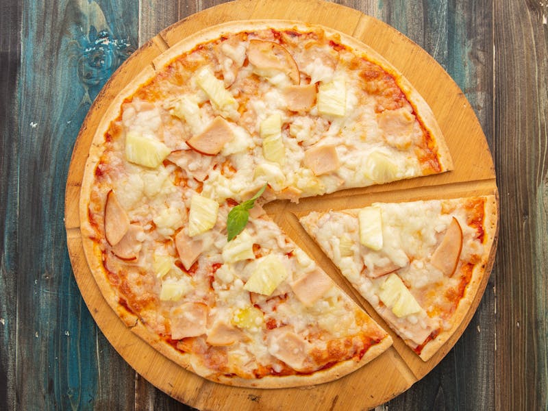 Hawaiian pizza with pineapple and ham